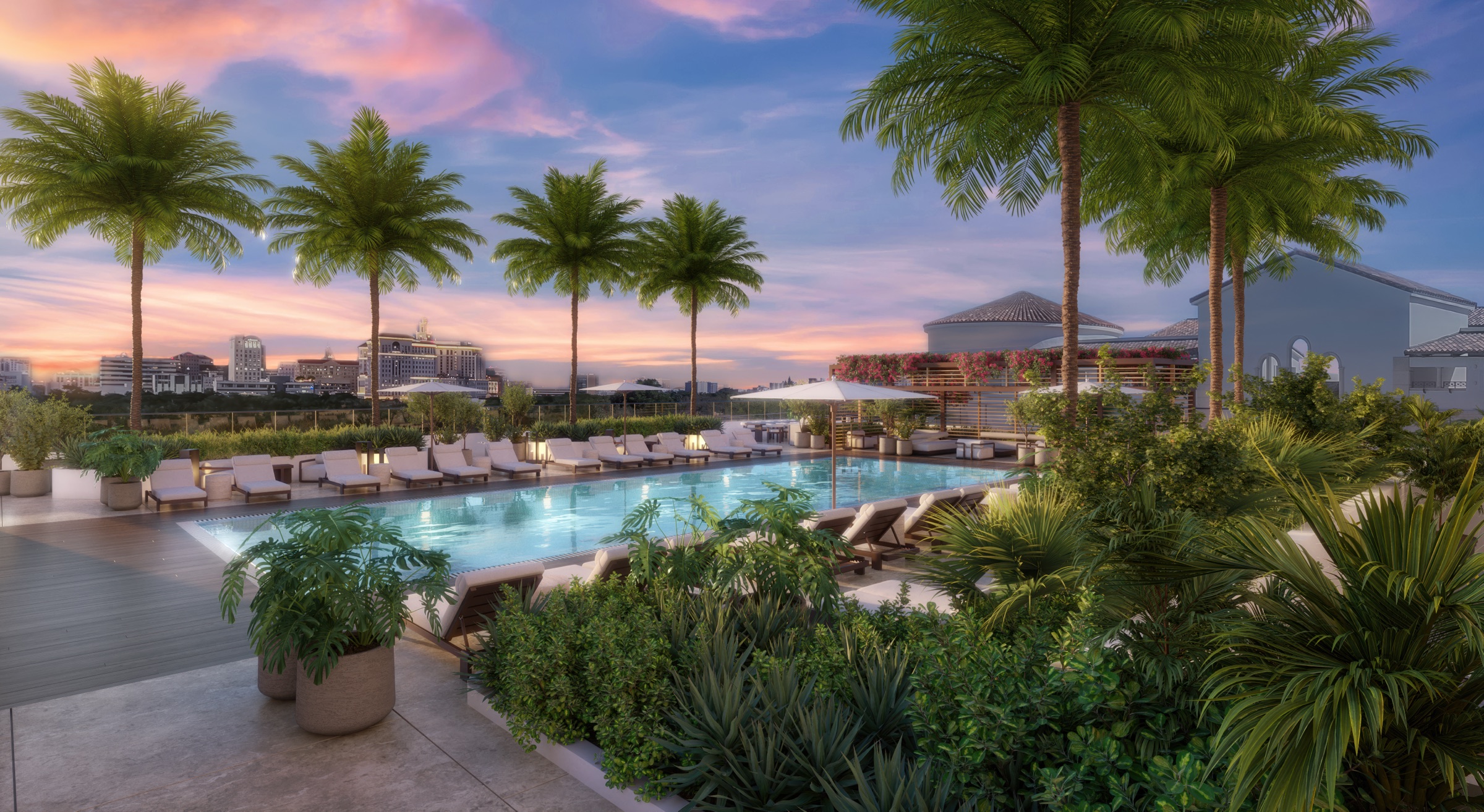 Resort-style heated pool deck at twilight