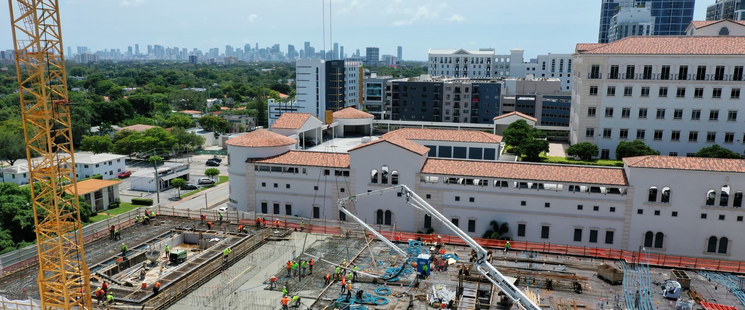 Looking north-east from the Cassia site: the Mediterranean rooftops of the Merrick Park district with the Brickell and Downtown skyline beyond